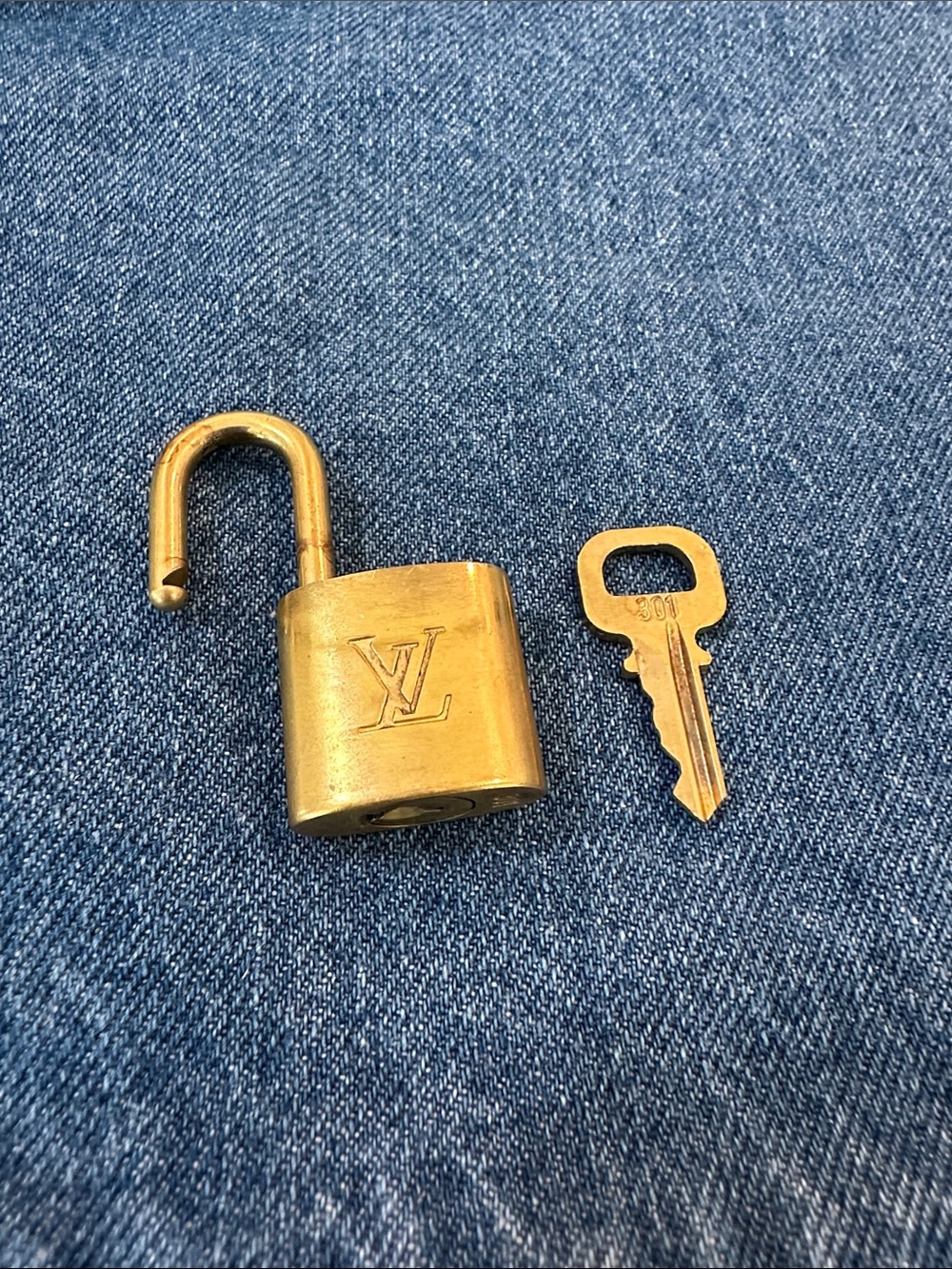 Louis Vuitton Gold Padlock and Key Set